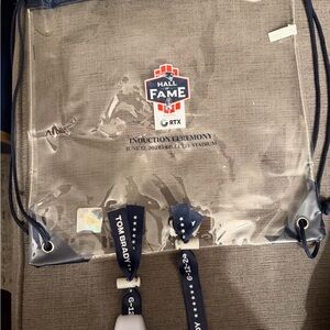 Clear Tom Brady Hall of Fame Drawstring Bag with Bracelets
